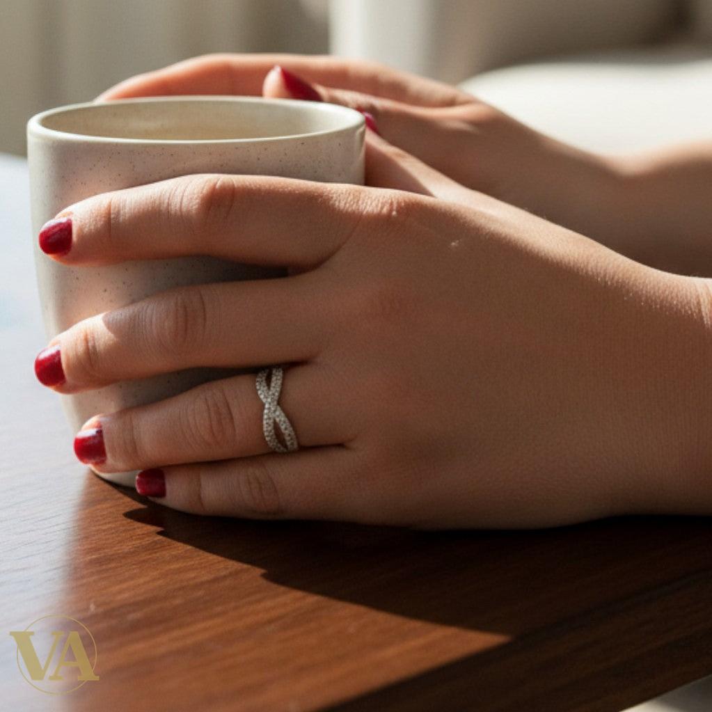 Bague argent 925 croisée zircons scintillants.