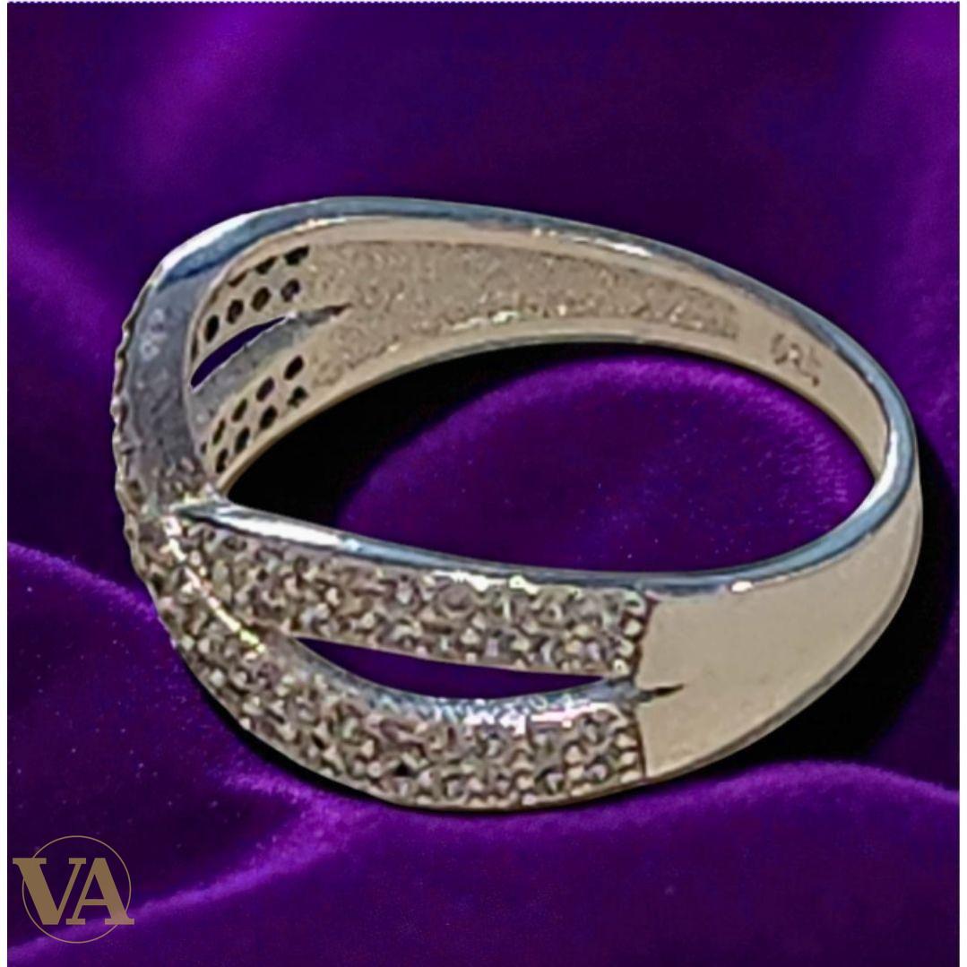 Bague argent 925 croisée zircons scintillants.