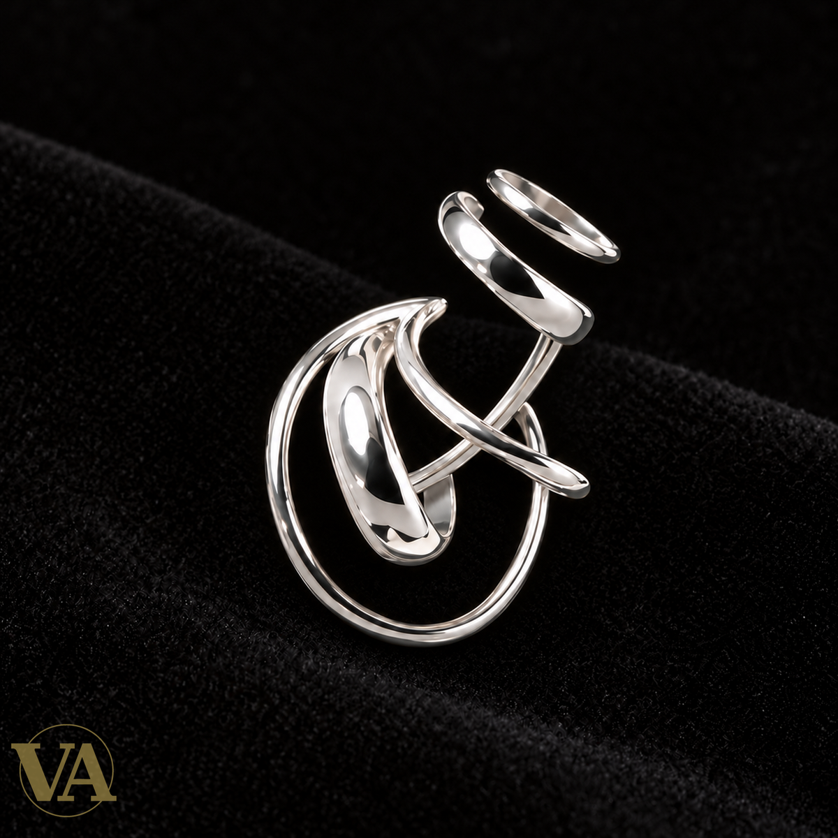 Bijou d’oreille à volutes en argent 925 rhodié, vendu à l’unité — vue du bijou
