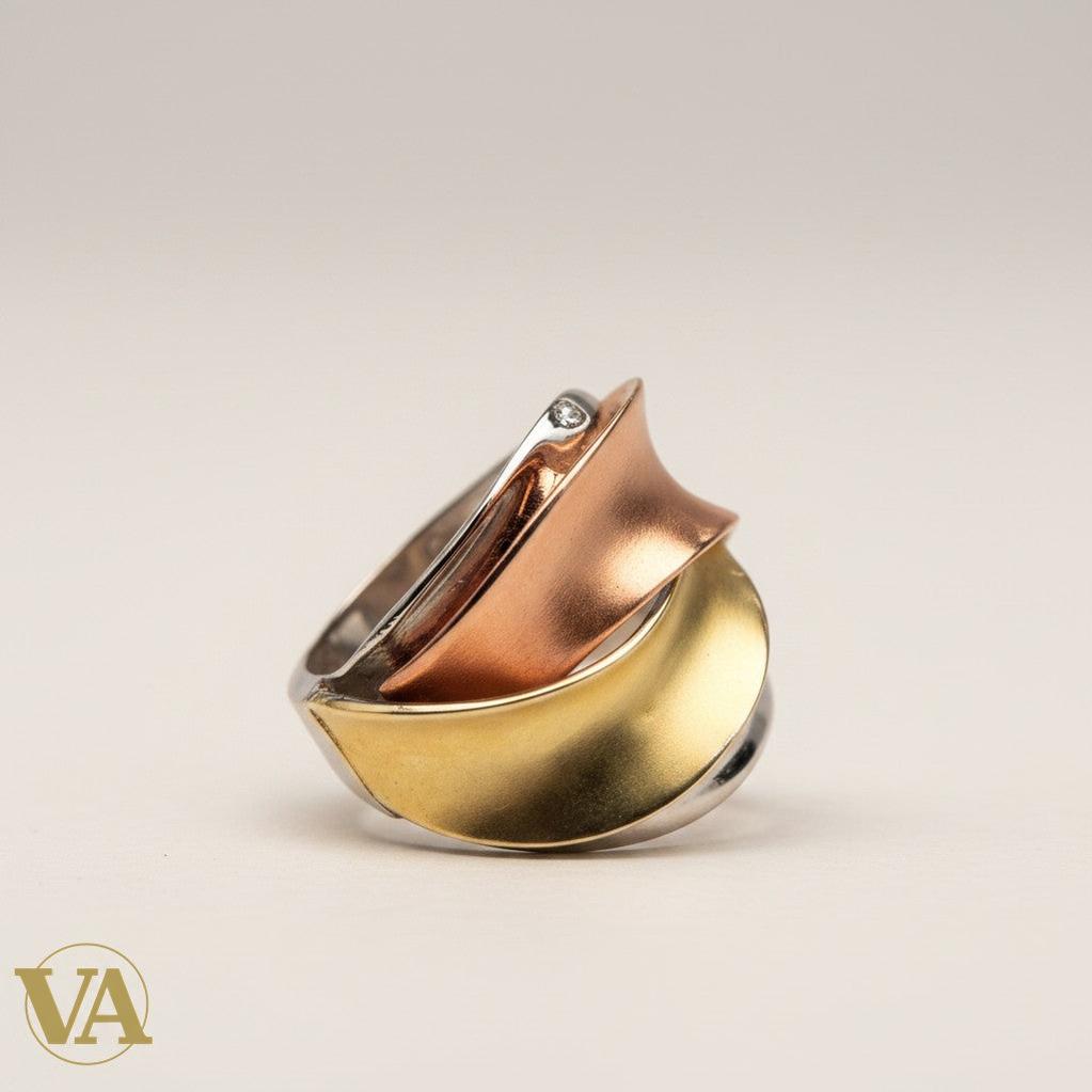Bague femme Vindicta en argent 925 trois couleurs entrelacées, finition brillante, dorée et rosée. Design moderne.