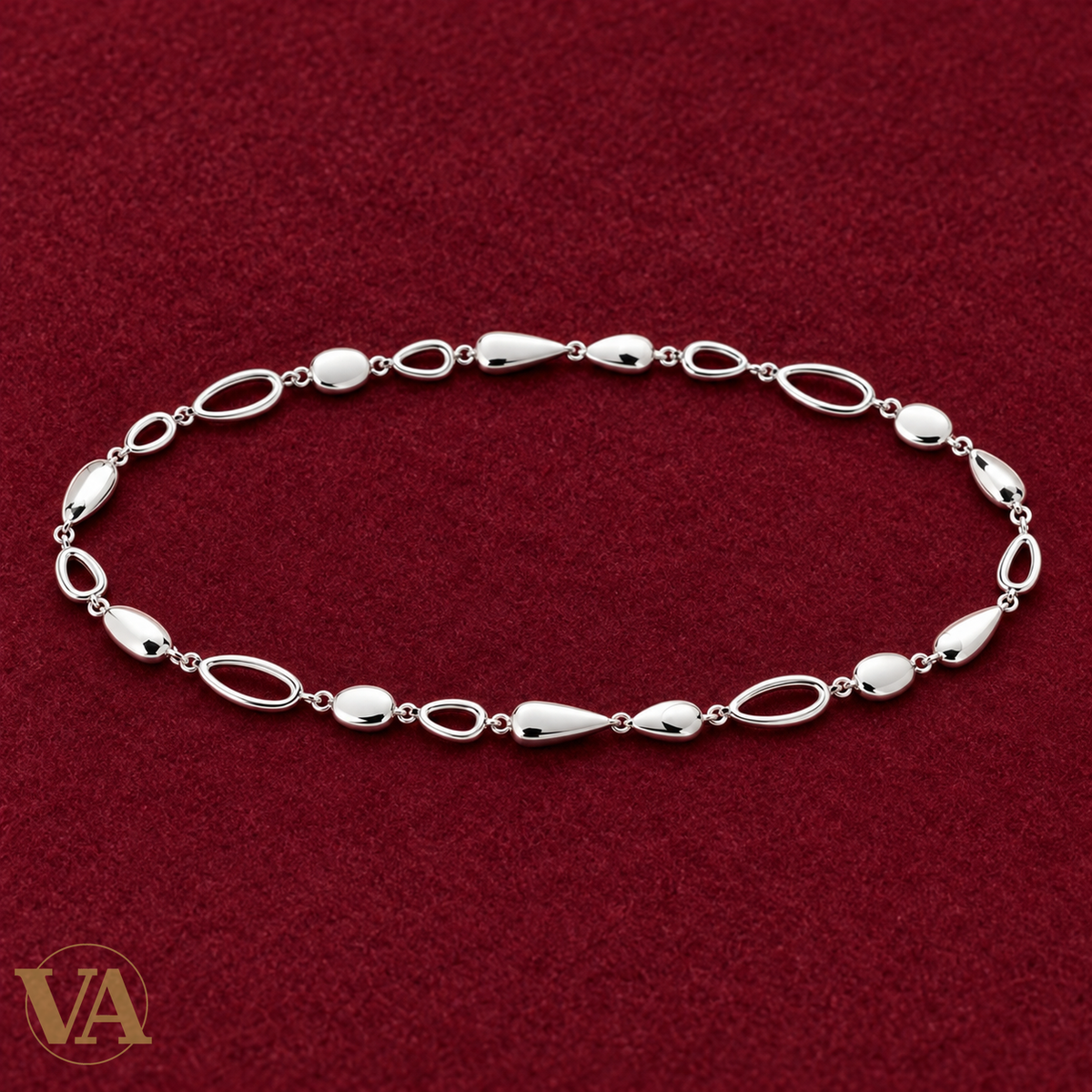 Bracelet gouttes et ovales polis en argent 925 rhodié sur feutre bordeaux