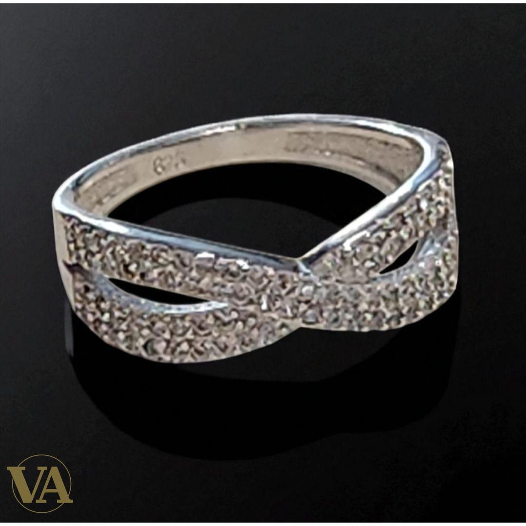Bague argent 925 croisée zircons scintillants.