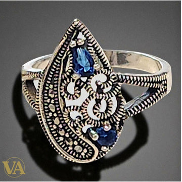 Bague Femme argent 925 ajourée pierres bleues et marcassites .