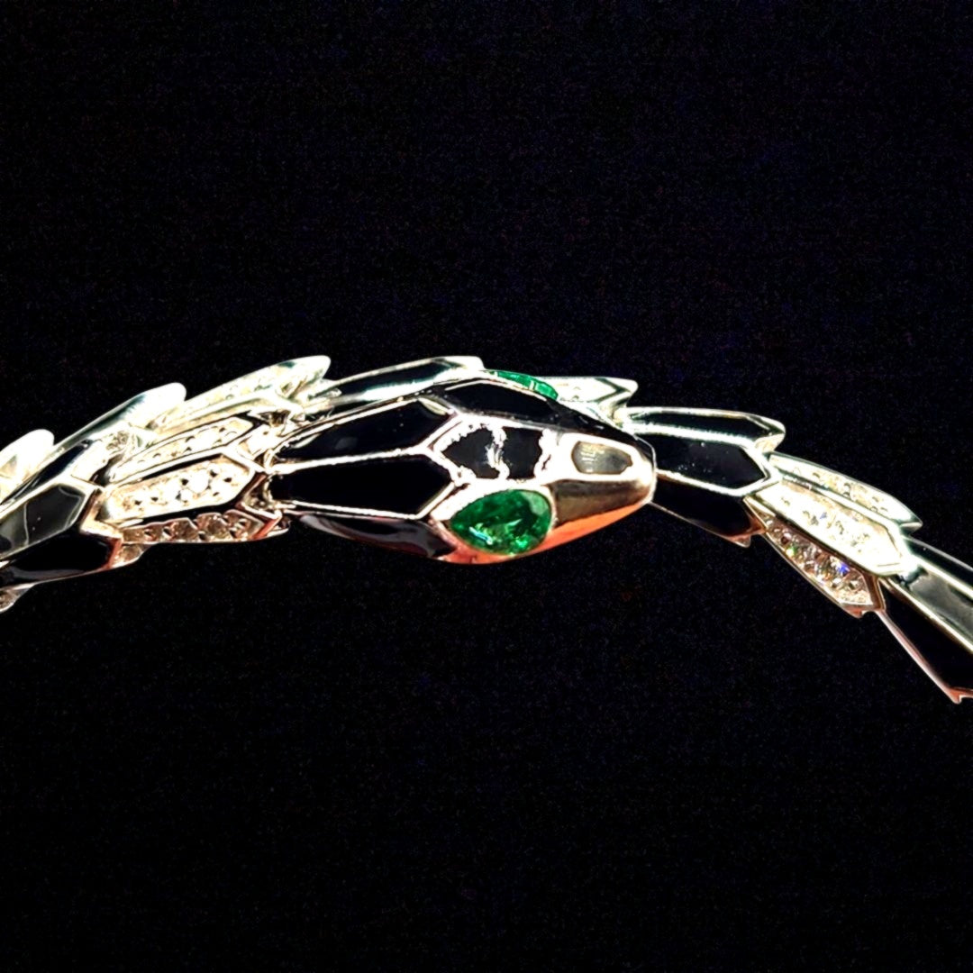 Bracelet serpent argenté avec onyx noir et yeux zircons verts
