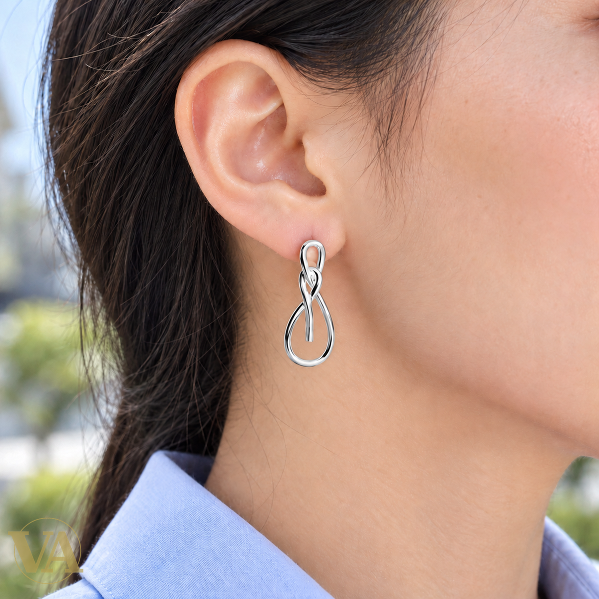 Boucles nœuds aux lignes fluides en argent 925 rhodié — portées