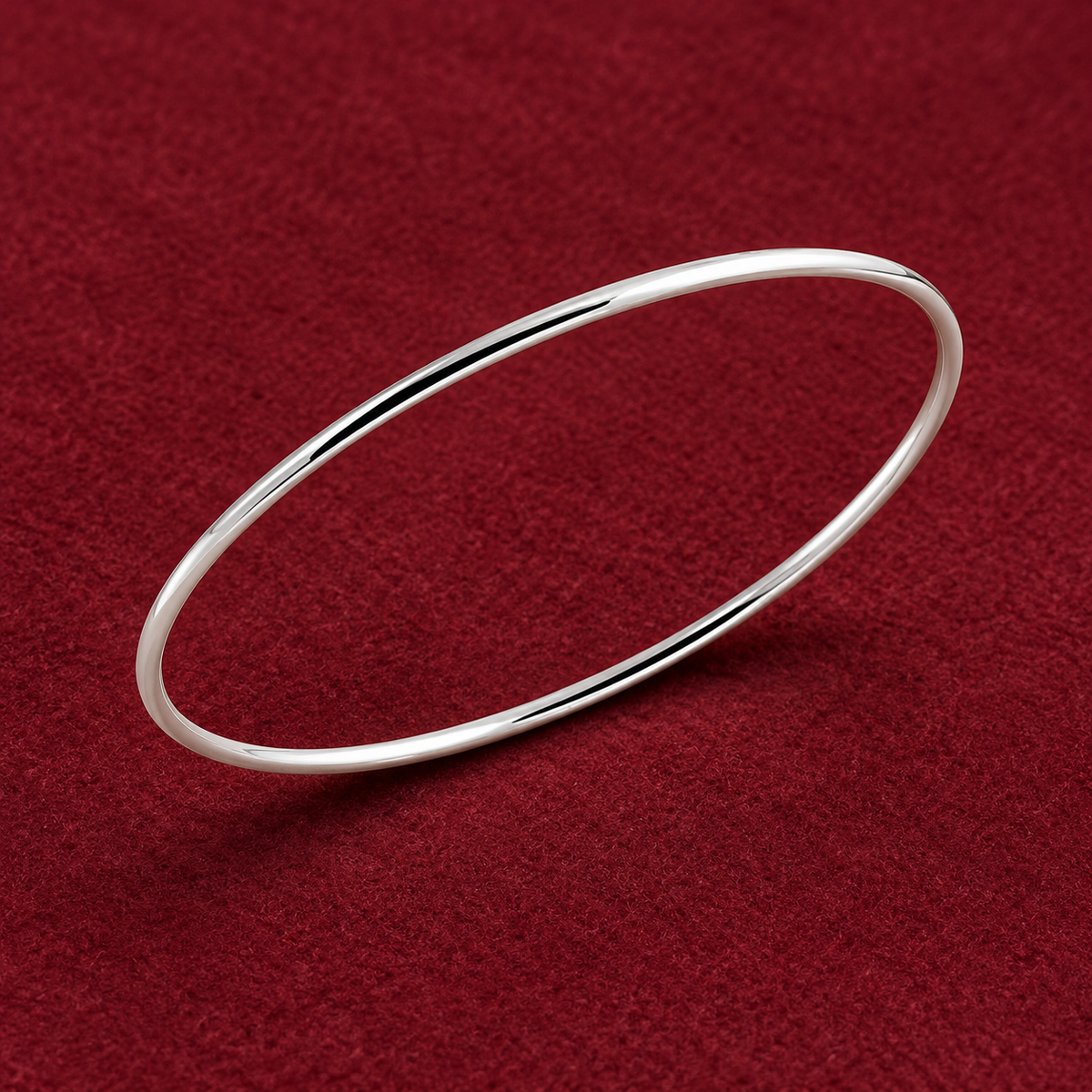 Bracelet jonc fin poli en argent 925 rhodié sur feutre bordeaux