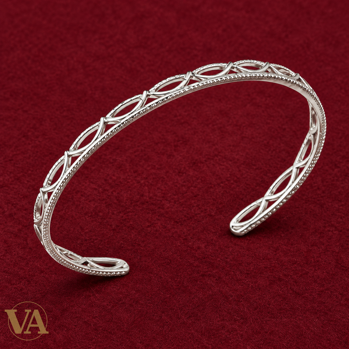 Bracelet jonc aux feuilles ajourées en argent 925 rhodié sur feutre bordeaux