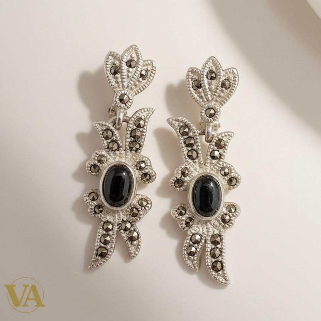 Vindicta Art Deco style sterling silver earrings with black onyx and marcasite detailing.