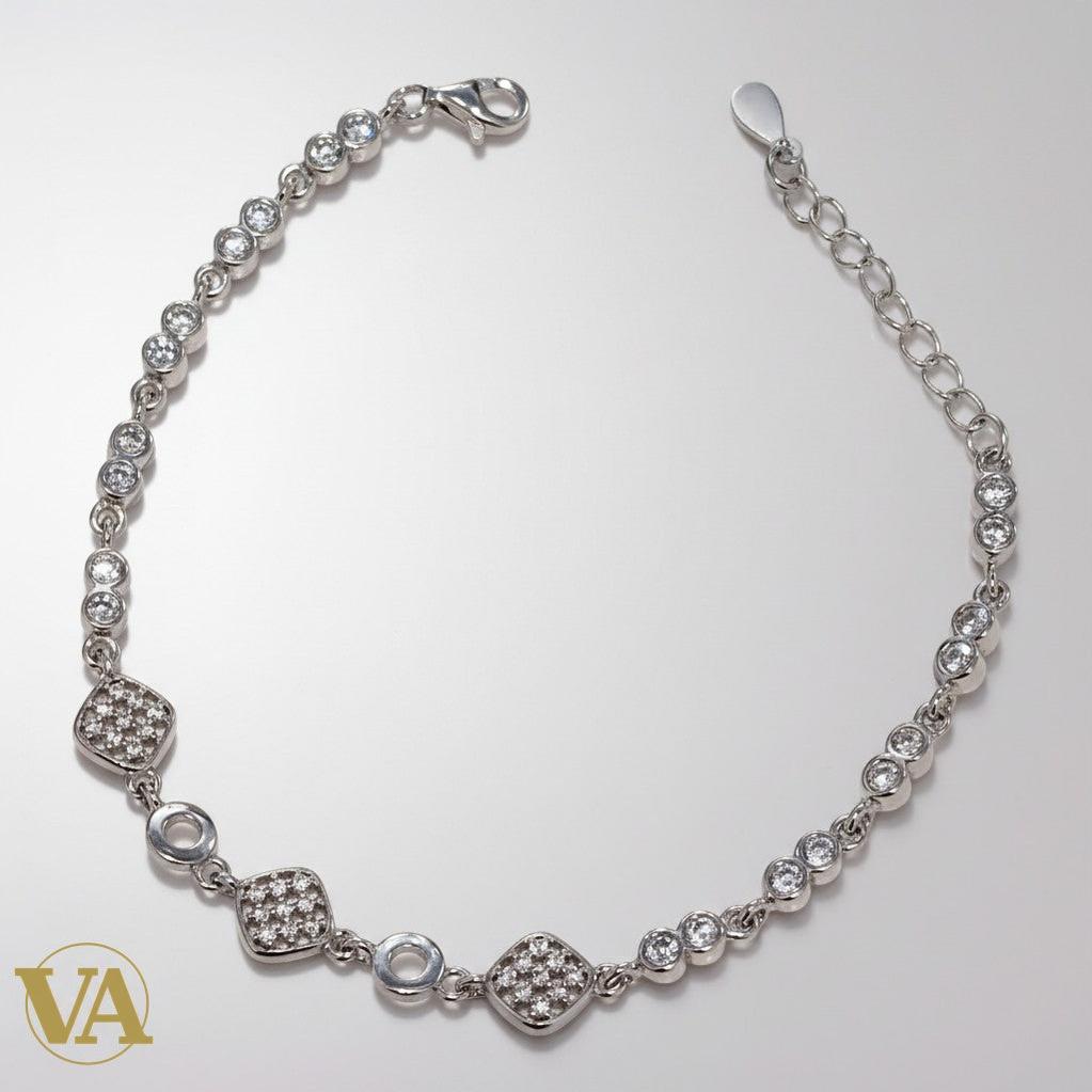 Bracelet femme Vindicta en argent 925, maillons ronds sertis de zirconium et pavés carrés, fermoir mousqueton.