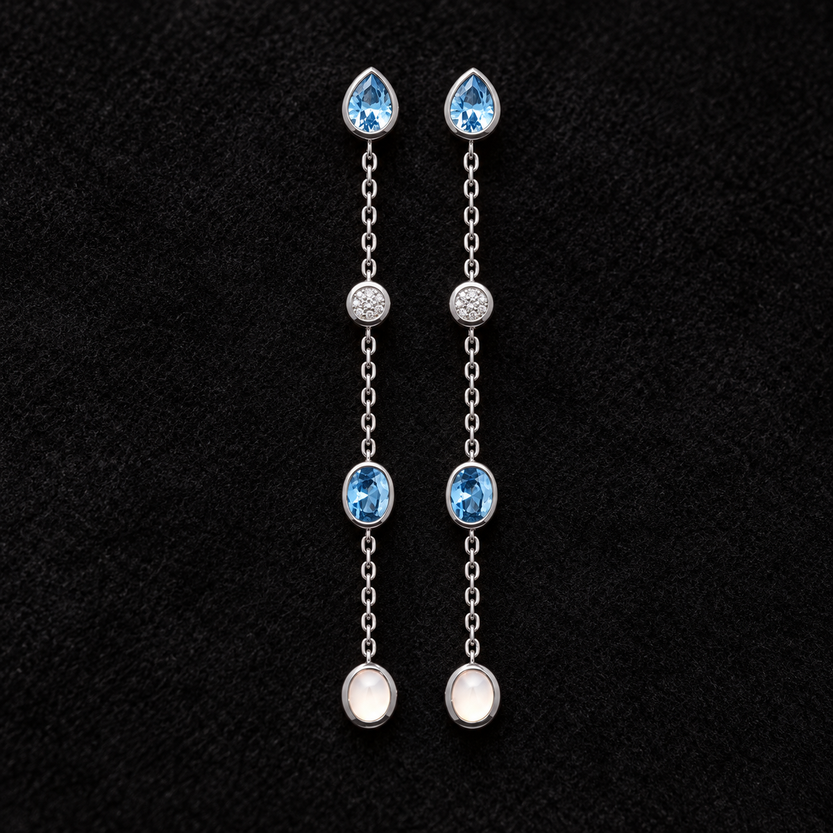 Boucles d’oreilles argent 925 rhodié — sur feutre noir