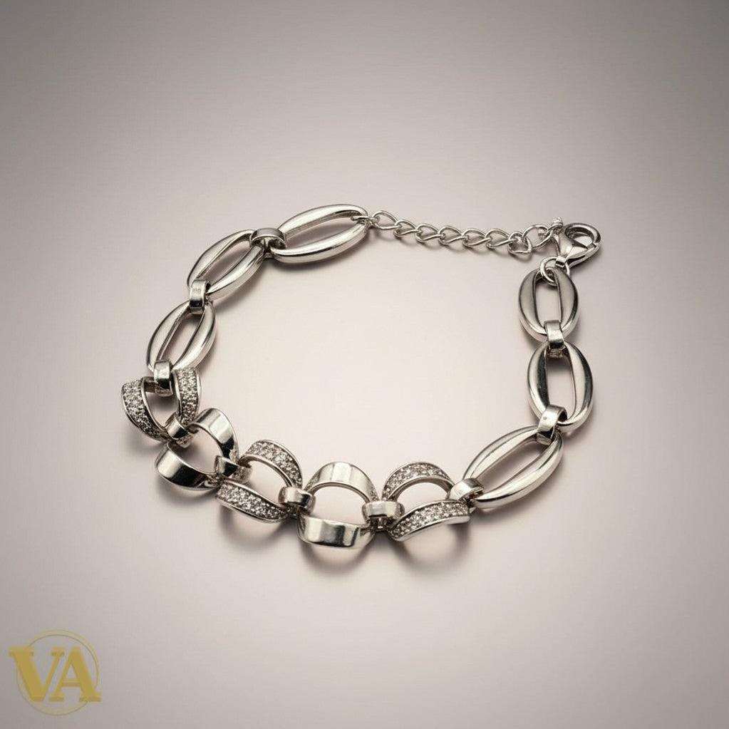 Bracelet Vindicta en argent 925, maillons ovales sertis de zircons, fermoir mousqueton, chaîne d'extension.